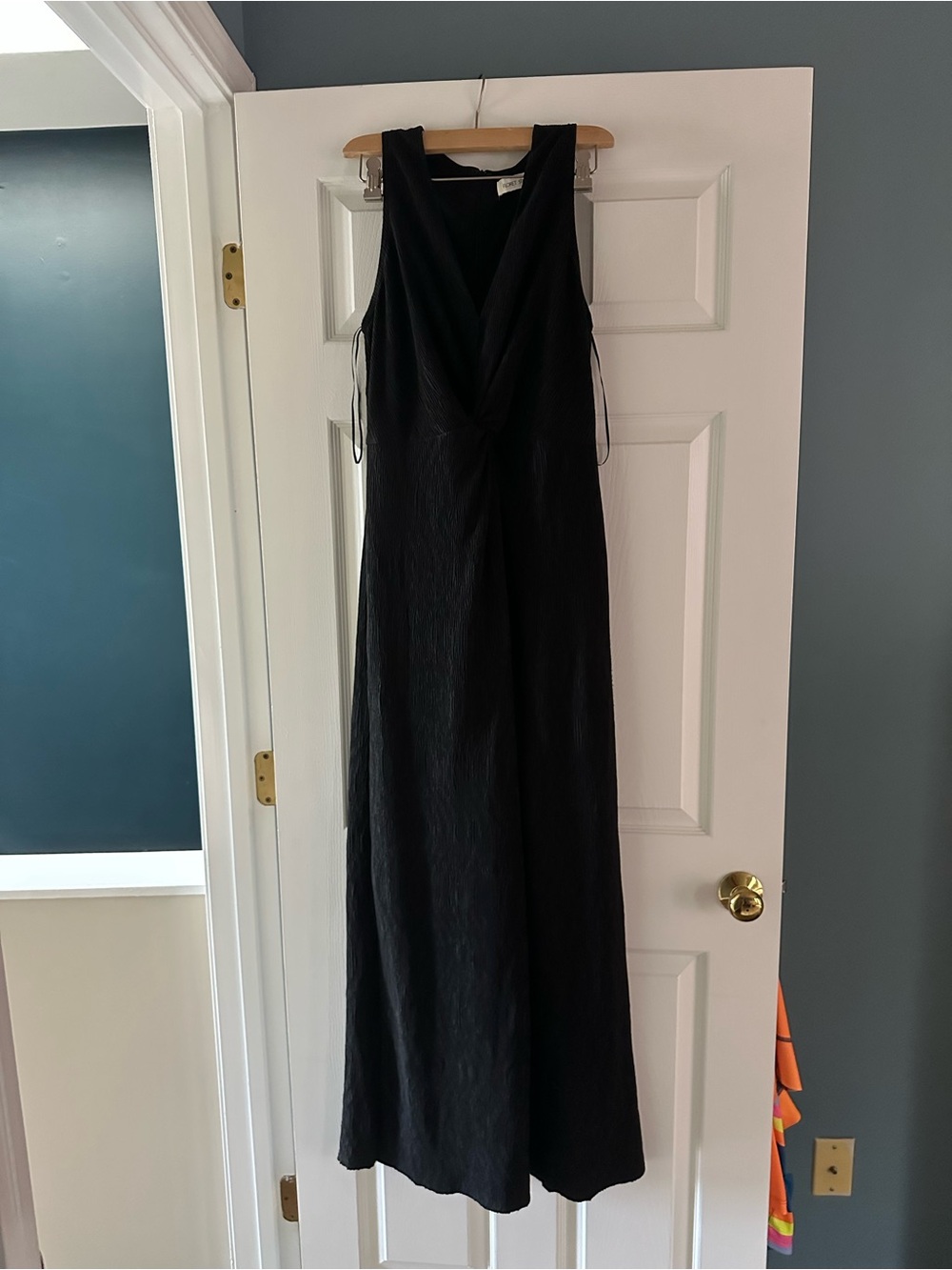 Black v-neck jumpsuit - M